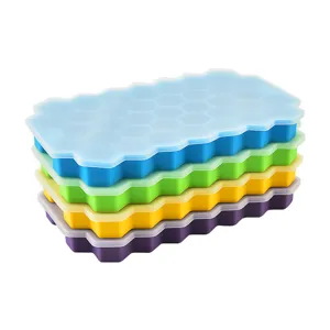 Silicone honeycomb ice cube trays with lids, flexible stacking ice molds for daily home use.