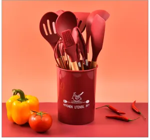 Silicone kitchen utensil set with wooden handles and storage holder for non-stick cookware cooking.