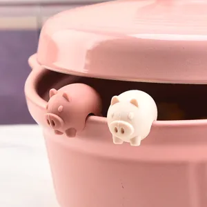 Cute silicone pot lid lifters, anti overflow pig shape clips for cooking pots and soup pans.