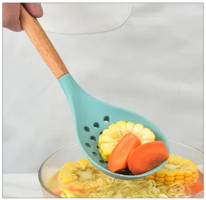 Silicone slotted spoon with wooden handle, heat resistant kitchen cooking colander tool.