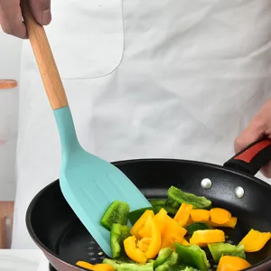 Wooden handle silicone spatula for non-stick cookware, heat resistant kitchen cooking tool.