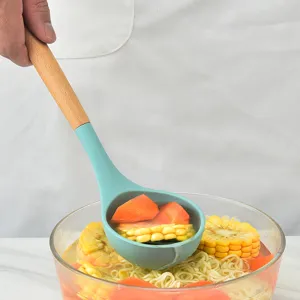 Ergonomic silicone soup ladle with wooden handle for kitchen cooking, durable tool.
