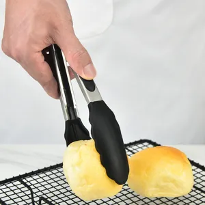 Pinza da cucina in acciaio inossidabile con punte in silicone per barbecue e pane.