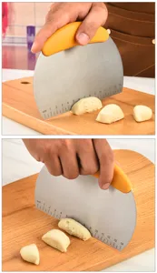 Stainless steel dough scraper with scale and handle for baking and cutting dough.