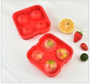4-hole round silicone ice ball mold, flexible whiskey ice sphere maker for home kitchen use.