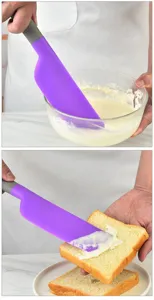 Silicone baking spatula detail showcasing cream mixing and butter spreading application.