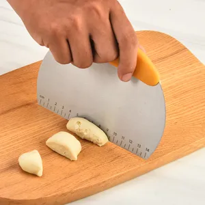 Stainless steel dough scraper with scale, baking tool for cutting pastry, bread, and fondant.