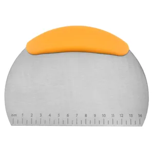 Stainless steel dough scraper with orange handle and measurement scale for baking pastry.