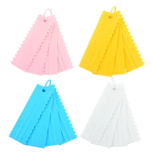 Plastic cake scraper set with various comb teeth patterns for DIY baking and decorating.