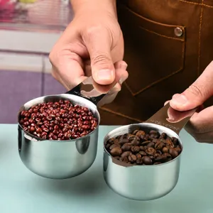 Stainless steel measuring cups and spoons set with clear scale for kitchen baking use.