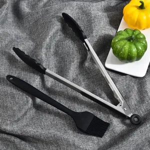 Stainless steel and silicone kitchen food tongs and basting brush set for cooking.