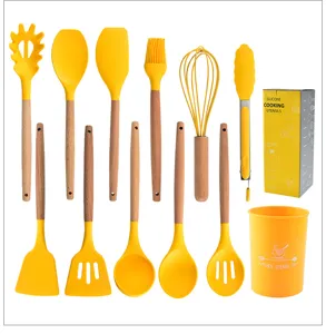 Silicone cooking utensils set with wooden handles, heat resistant kitchen tool set for home cooking.