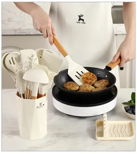 Silicone kitchen utensil set with wooden handles, detailed view of cooking tools and holder.