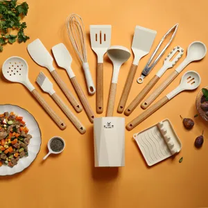 Silicone kitchen utensil set details, wooden handle spatula and whisk kitchen accessories.