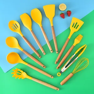 Silicone kitchen utensils set with wooden handles, heat resistant cooking tools, yellow.