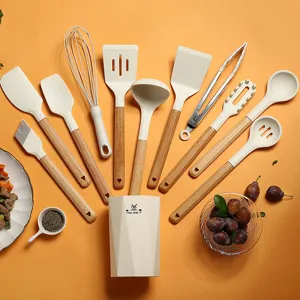 Detailed view of the silicone kitchen utensil set with wooden handles, neatly arranged.