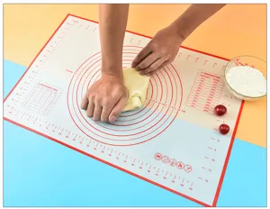 Silicone kneading mat with measurements and baking conversion charts for easy dough rolling.