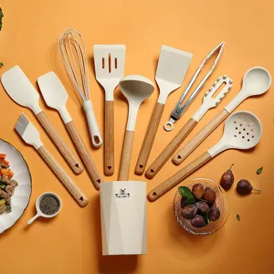 Silicone kitchen utensil set detail showing whisk spatula ladle and wooden handle design details.
