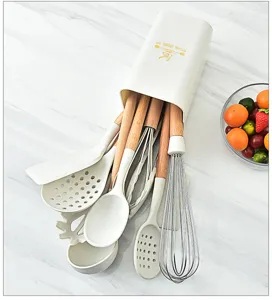 Juego de utensilios de cocina de silicona con mangos de madera, antiadherente para el hogar.