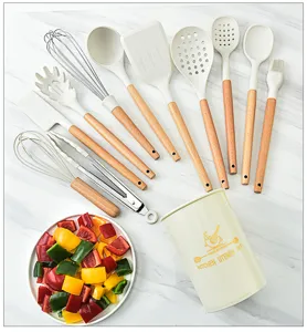 Juego de utensilios de cocina de silicona con mangos de madera antiadherente soporte