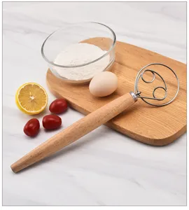 Stainless steel Danish dough whisk with wooden handle for baking flour mixing tools.
