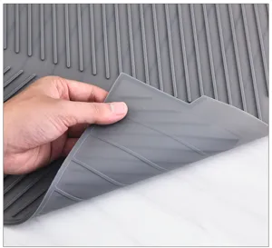 Siliconen druipmat detail close up toont flexibel materiaal en antislip afvoerribben.