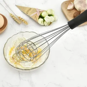 Edelstahl Schneebesen Handrührgerät mit ergonomischem Griff zum Backen und Kochen in der Küche.