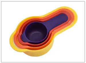 Plastic rainbow nested measuring spoon set, colorful kitchen baking tools for cooking.
