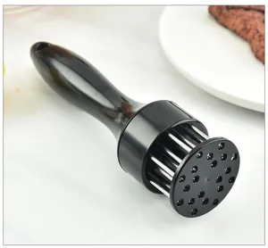 Stainless steel meat tenderizer tool with sharp pins and black handle for kitchen cooking.