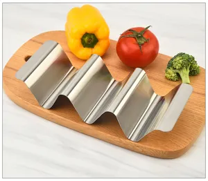 Stainless steel taco holder stand, durable wavy design kitchen rack for delicious burritos.