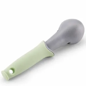Plastic ice cream scoop with ergonomic handle for kitchen dessert tool main product background