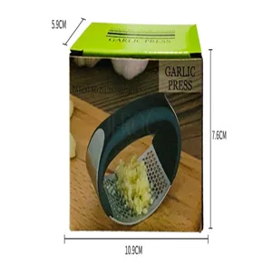 Stainless steel curved garlic press with comfortable plastic handle for kitchen use.