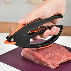 Multi-functional plastic kitchen meat tenderizer tool with ergonomic handle for easy food prep.