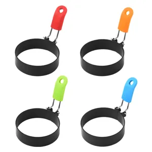 Stainless steel fried egg ring mold with colorful silicone handles for kitchen use.