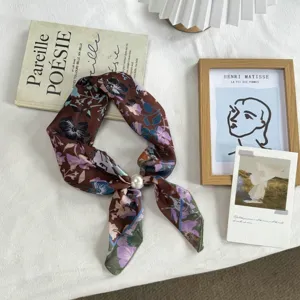 Vintage floral silk scarf neckerchief hair band with elegant pearl buckle detail shot.