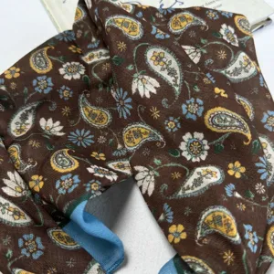 Brown paisley floral silk ribbon scarf with blue trim, elegant fashion accessory for women.