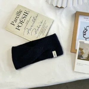Cozy knitted hair band for women, soft plush wide headband in dark color, daily autumn accessory.