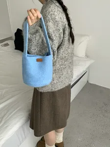 Korean ins style wool felt bucket bag for women, retro autumn winter shoulder handbag.