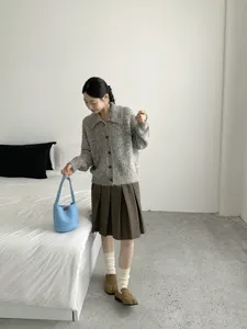 Korean style fuzzy bucket bag in light blue, soft plush material with a chic mini leather patch.