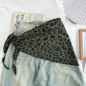 Green leopard print triangular scarf detail, lightweight summer shawl and stylish neck wrap.