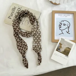 Knitted long scarf with retro wooden beads, snowflower pattern sweater accessory detail.
