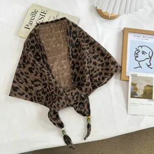 Leopard print triangular scarf, chic summer shawl and stylish sun protection wrap for women.