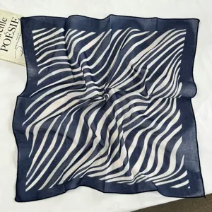Retro blue and white wave pattern square scarf, lightweight fabric, elegant neck accessory for women.