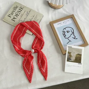 Red polka dot narrow twilly scarf with pearl accent, chic neckerchief for women spring and summer.