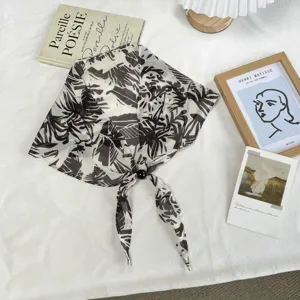 Chic black and white tropical leaf chiffon triangle scarf with elegant beaded knot for summer.