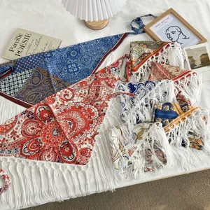 Boho vintage paisley print fringe lace-up triangle scarf detail, stylish women's accessory.