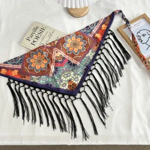 Bohemian ethnic floral print triangular scarf with elegant black tassels and long ties.