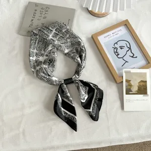 Chic black and white printed silk scarf, versatile neckerchief and stylish hair band accessory.