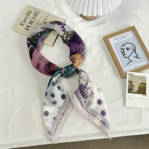Artistic printed square silk scarf for women, elegant neckerchief and versatile accessory.