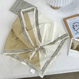Retro two-tone triangular silk scarf with chic chain border, elegant fashion accessory.